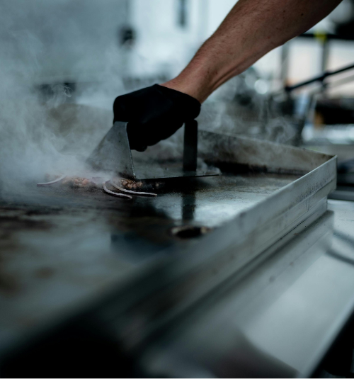 Technician servicing commercial griddle in Dubai